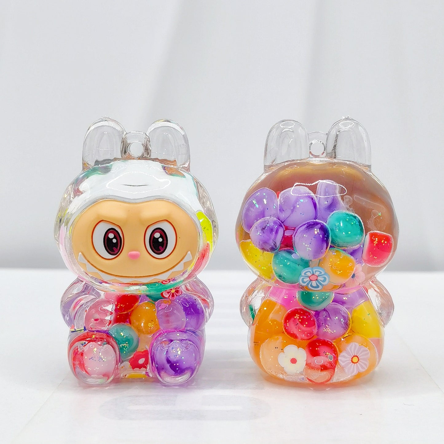 Creative quicksand ornament luminous rabub flash keychain pendant