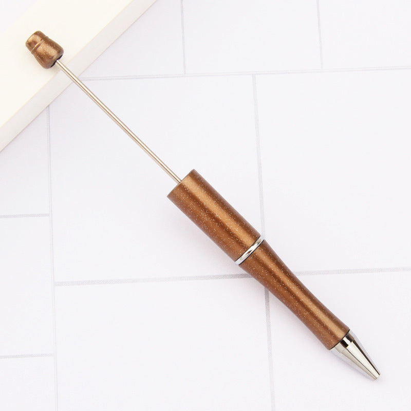 Creative handmade beaded pen DIY beaded multi-color spinning ballpoint pen hot-selling educational student stationery wholesale