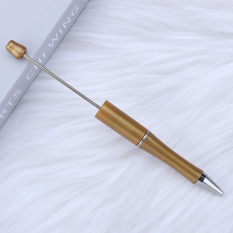Creative handmade beaded pen DIY beaded multi-color spinning ballpoint pen hot-selling educational student stationery wholesale