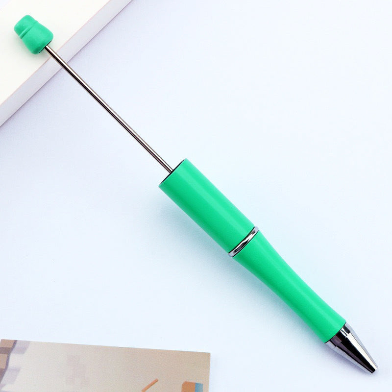 Creative handmade beaded pen DIY beaded multi-color spinning ballpoint pen hot-selling educational student stationery wholesale